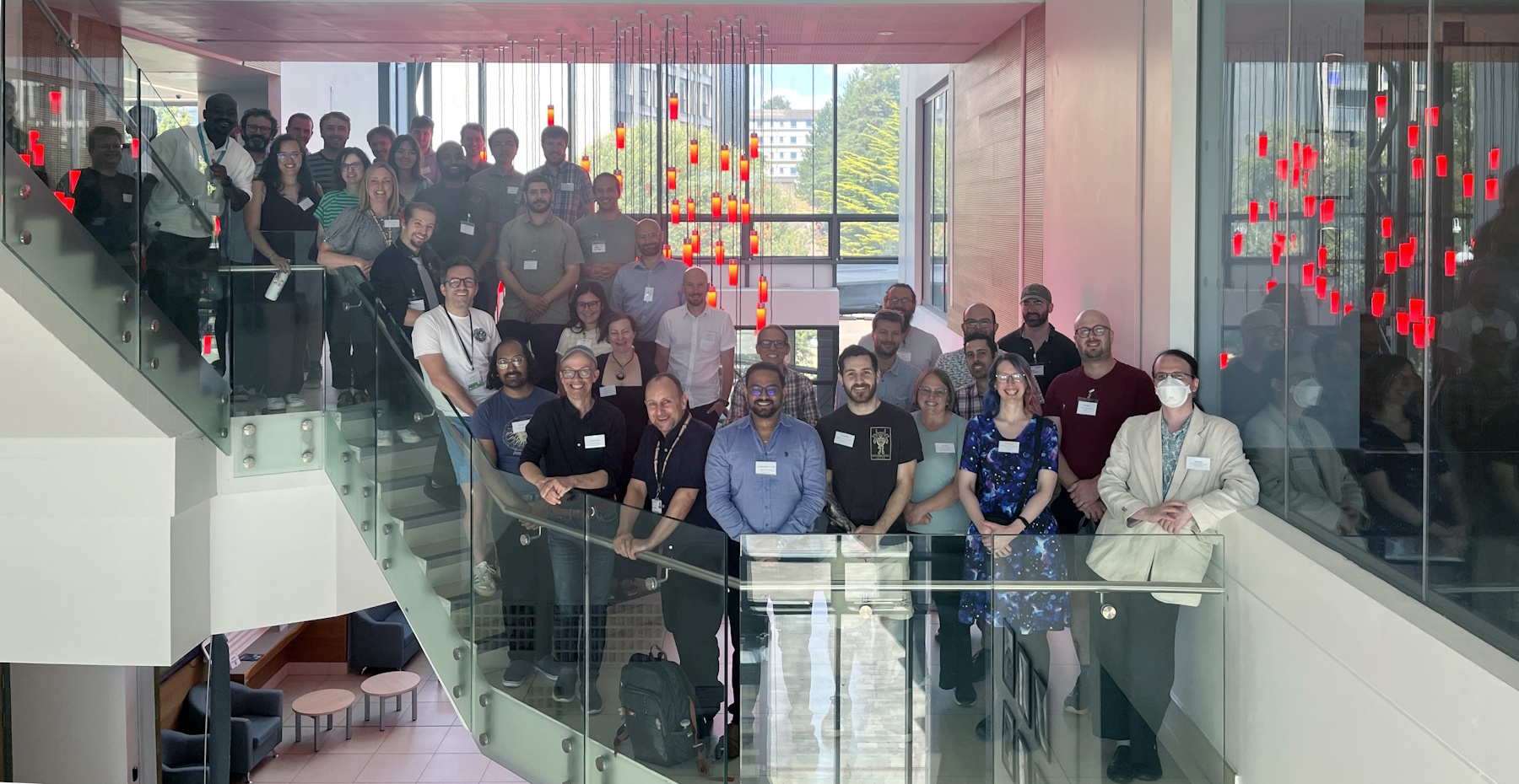 Attendees of the fourth RSE South West regional meeting pose on a staircase in the 10W building in the University of Bath.